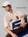 TSS Originals: Travel Badges Oversized Polos